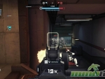 ghost-in-the-shell-first-assault-online-firing-down-corridor